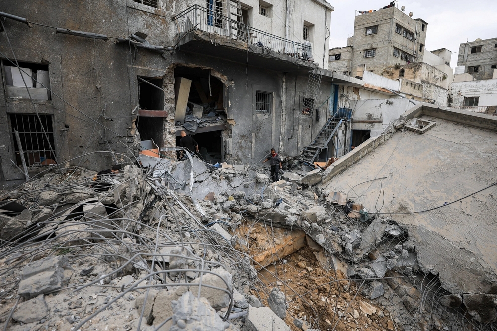 Một khu vực ở Gaza bị phá hủy hoàn toàn sau cuộc tấn công của quân đội Israel (Ảnh: Reuters)