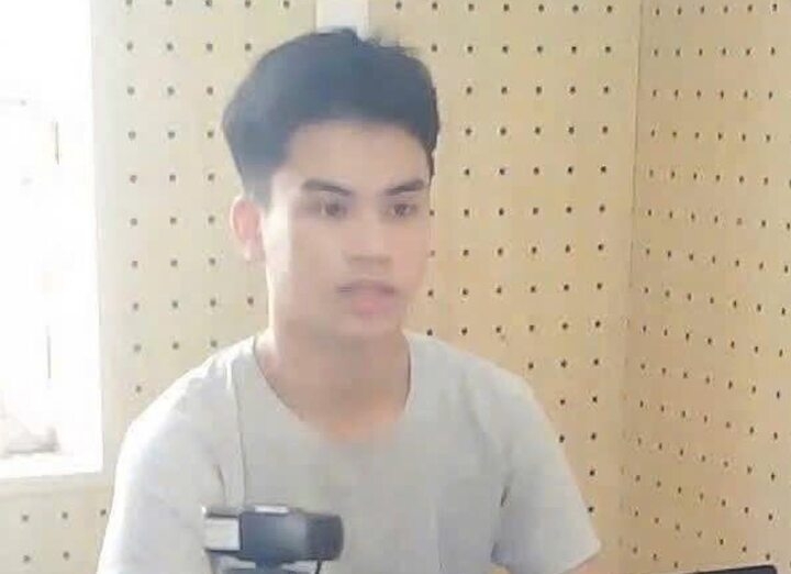 Nguyễn Minh Hiếu tại cơ quan công an.