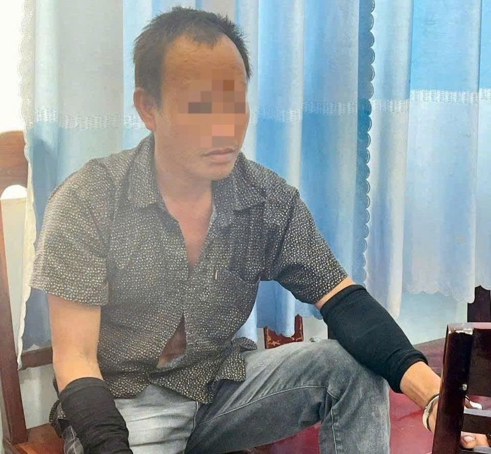 Phạm Ngọc Ao tại cơ quan công an. Ảnh: B.H