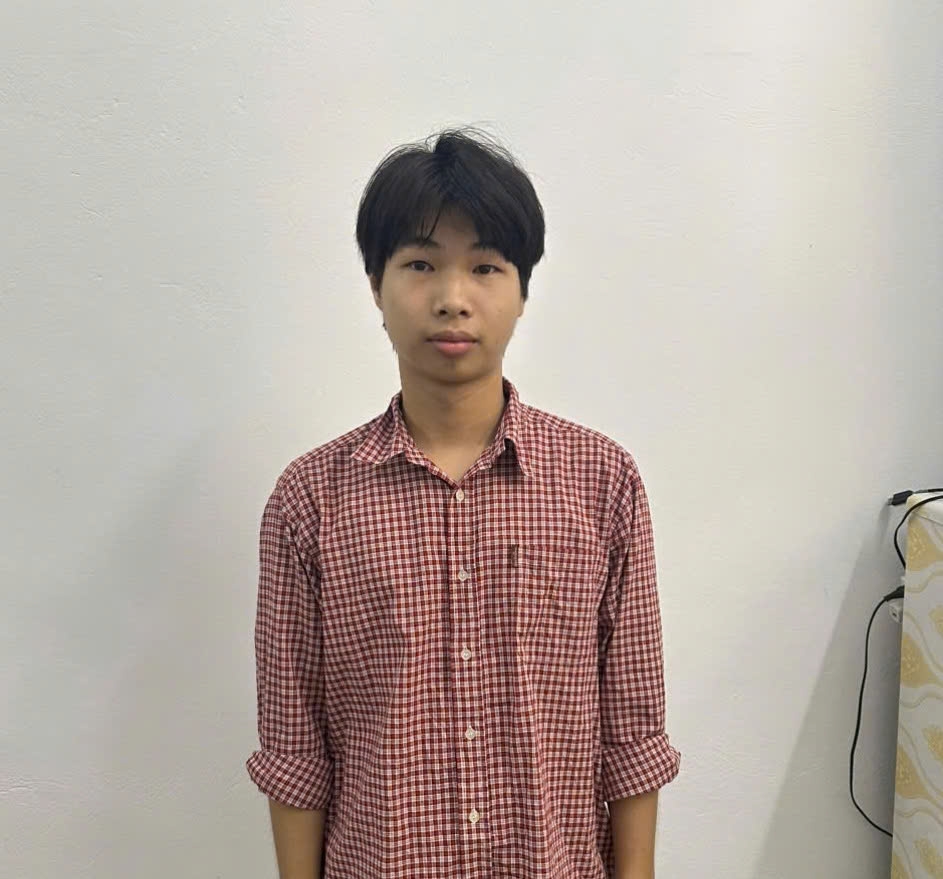 Đối tượng Bùi Lại Việt Anh tại cơ quan công an. Ảnh: Hồ Hưng