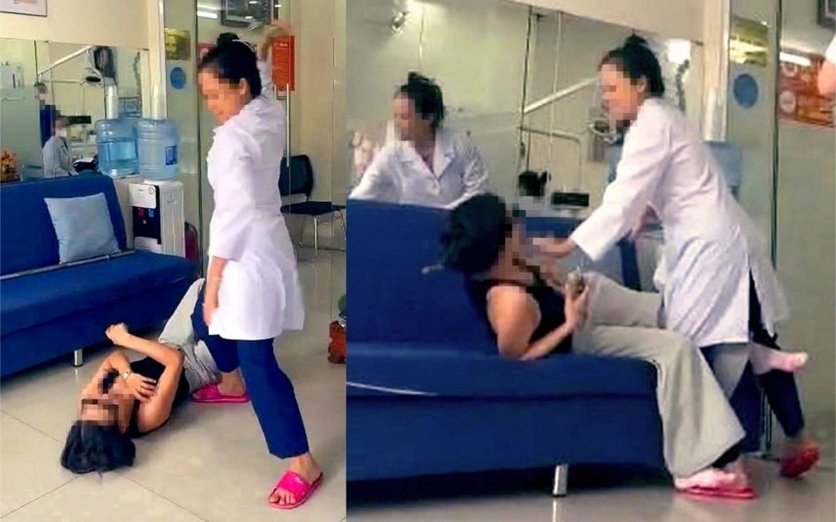 Ảnh chụp màn hình đoạn clip người phụ nữ mặc áo blouse hành hung khách hàng.