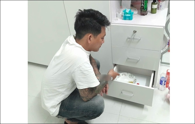 Trần Quốc Hào và các tang vật phạm pháp