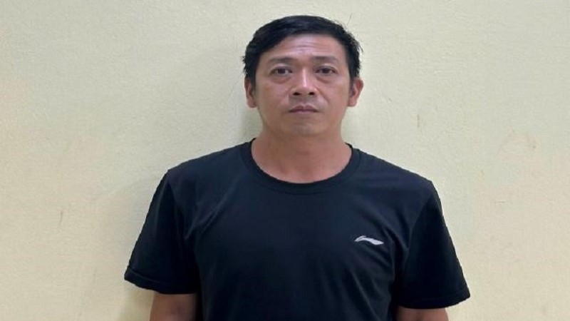 Trần Tiến Trình tại cơ quan công an