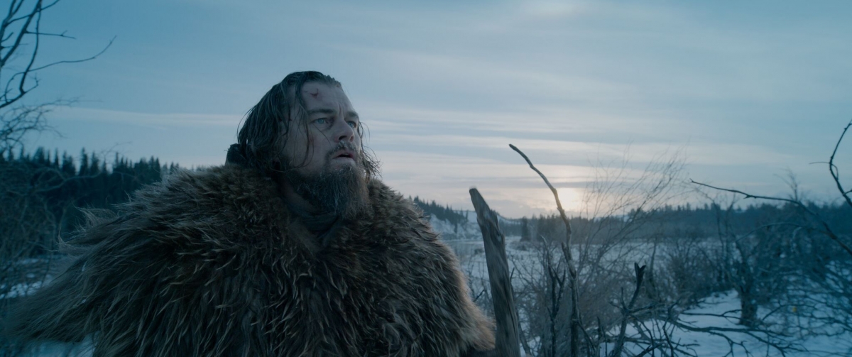 Trong “The Revenant” (2015), DiCaprio nhập vai người đàn ông sống sót giữa thiên nhiên khắc nghiệt, chiến đấu đến tận cùng bản năng. (Ảnh: New Regency)