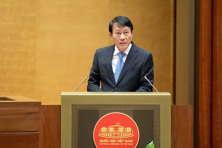 Bộ trưởng Bộ Công an Lương Tam Quang trình bày Tờ trình tóm tắt tại Kỳ họp thứ 10. Ảnh: Quốc hội