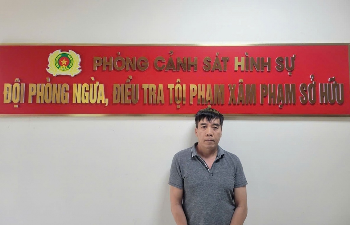 Đối tượng Trần Mạnh Toàn tại cơ quan công an