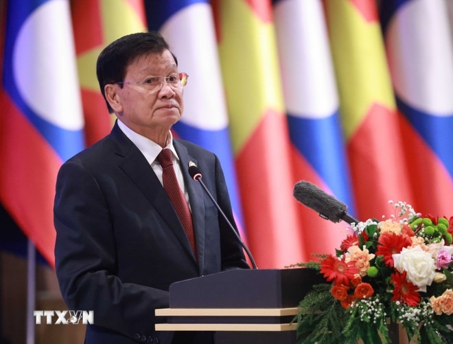 Tổng Bí thư Ban Chấp hành Trung ương Đảng Nhân dân Cách mạng Lào, Chủ tịch nước Cộng hòa Dân chủ Nhân dân Lào Thongloun Sisoulith phát biểu. (Ảnh: TTXVN)