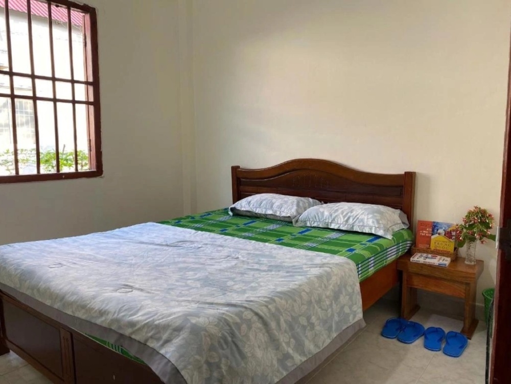 Phòng nghỉ ở Your House PQ 2. Ảnh: Agoda