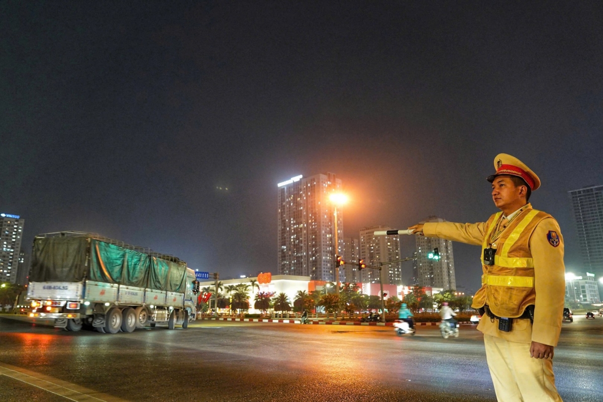 Lực lượng Cảnh sát giao thông tổ chức phân luồng giao thông phục vụ Đại hội XIV. Ảnh: Bộ Công an cung cấp.