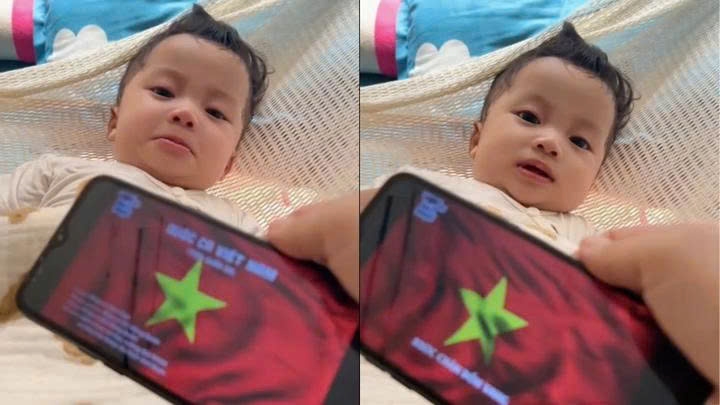 Nhiều dân mạng nhận định em bé đúng là yêu nước từ trong nôi. (Ảnh chụp màn hình)