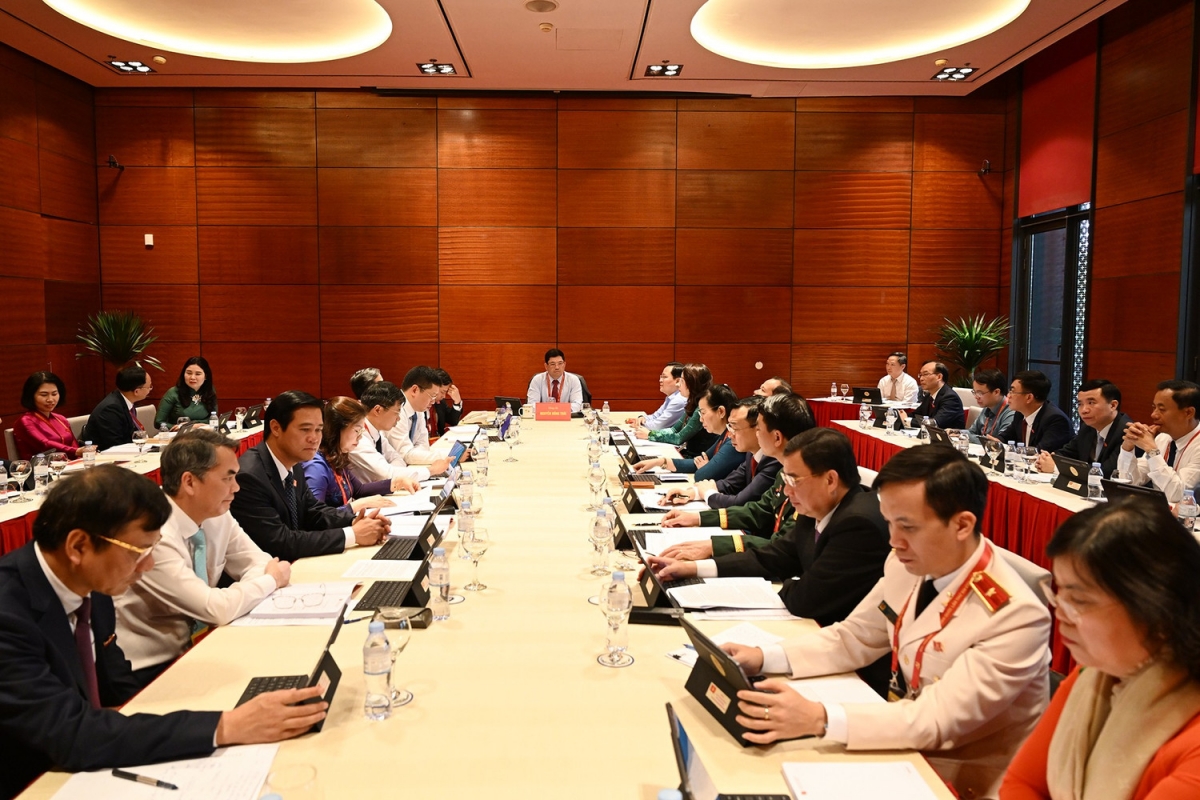 Các đại biểu thảo luận các văn kiện Đại hội. Ảnh: TTXVN