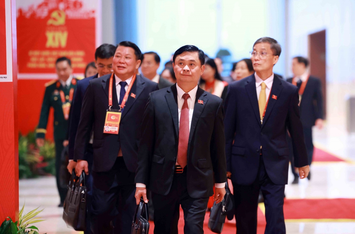 Các đại biểu đến dự Đại hội XIV của Đảng. Ảnh: TTXVN