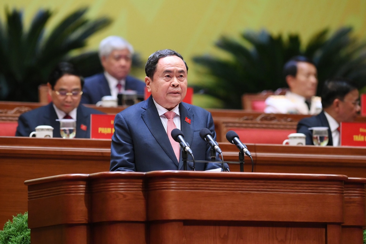 Đồng chí Trần Thanh Mẫn thay mặt Đoàn Chủ tịch báo cáo kết quả bầu Bộ Chính trị, Tổng Bí thư, Ban Bí thư, Ủy ban Kiểm tra Trung ương, Chủ nhiệm Ủy ban Kiểm tra Trung ương khóa XIV. Ảnh: TTXVN