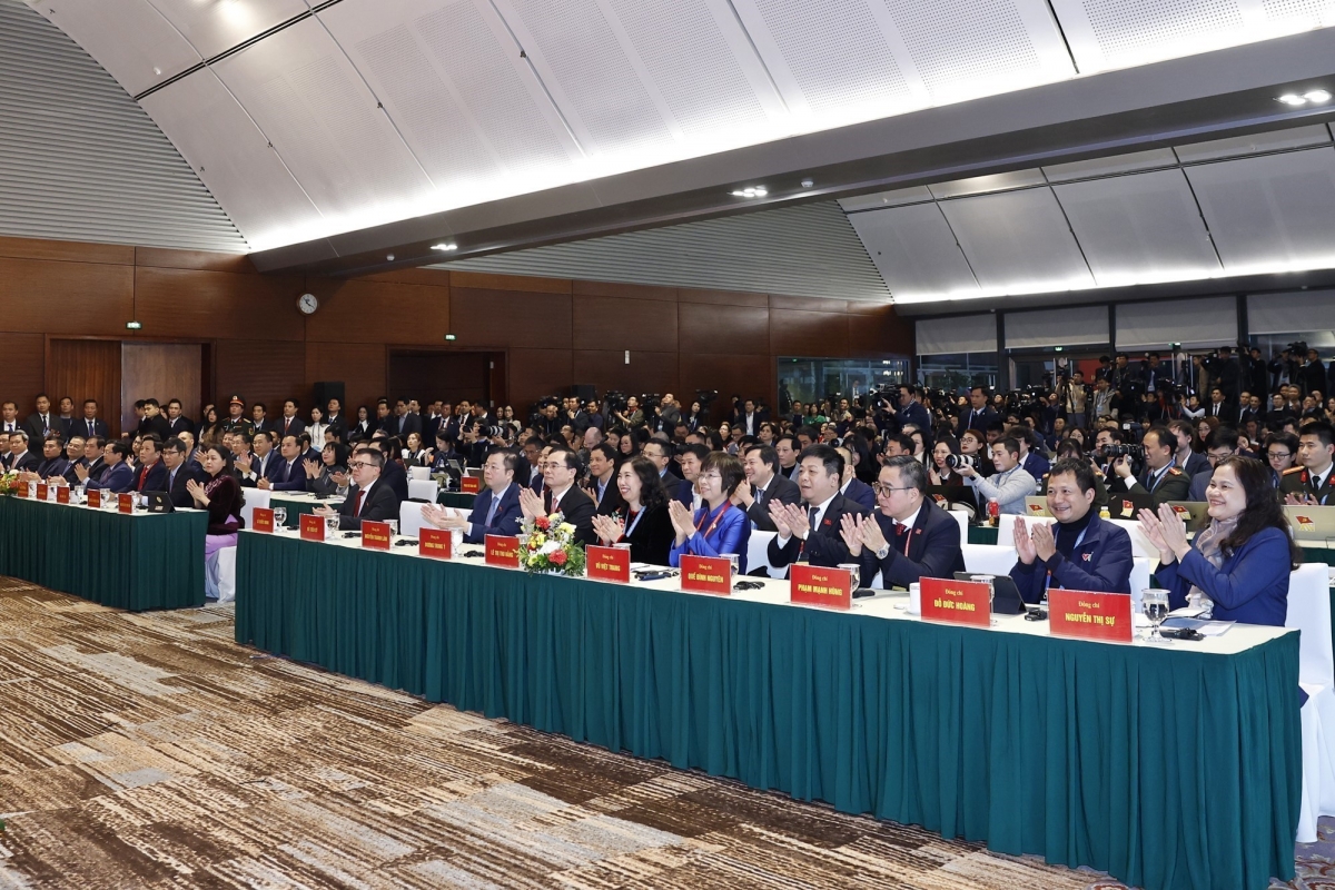 Các nhà báo trong nước và quốc tế tham dự buổi họp báo. Ảnh: TTXVN