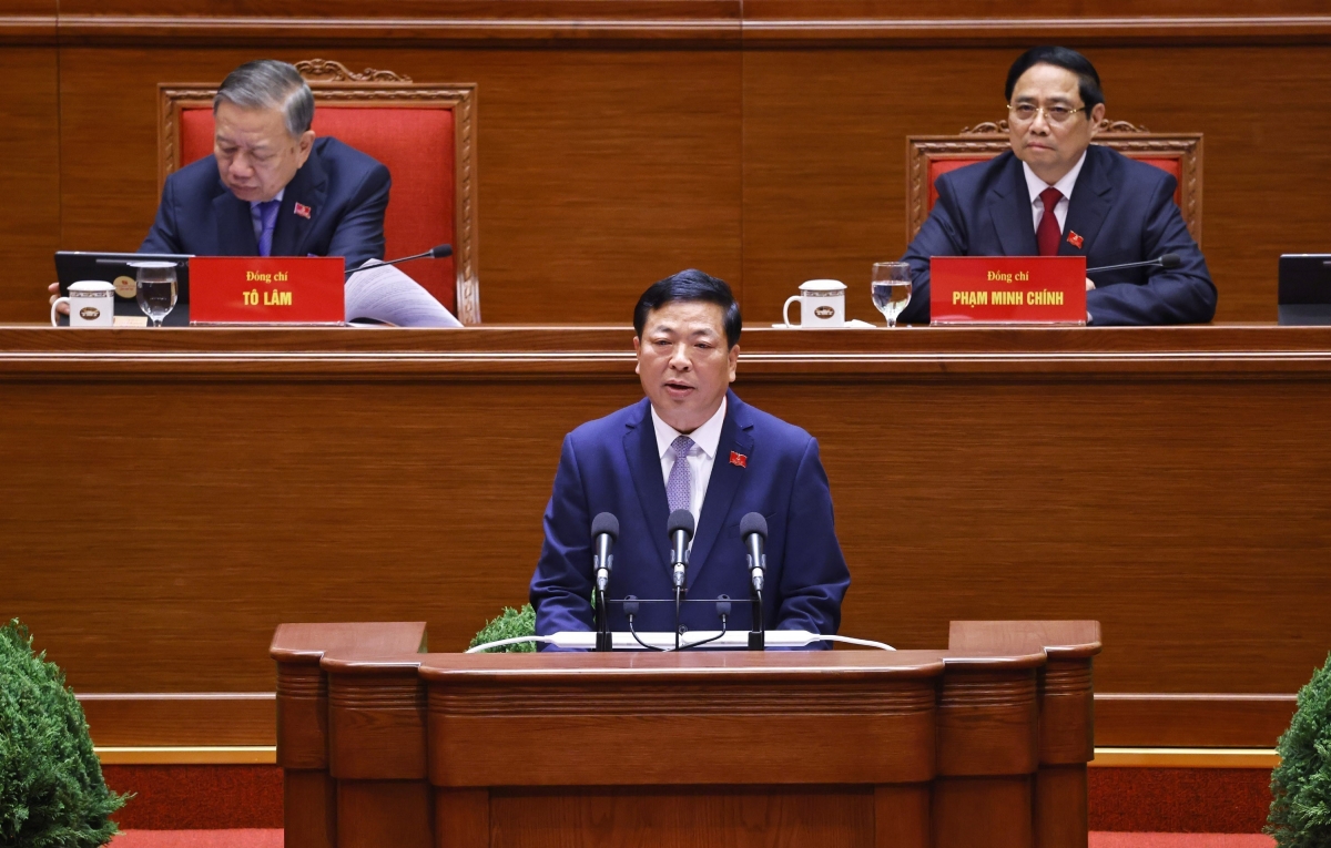 Bộ trưởng Bộ Xây dựng Trần Hồng Minh tại buổi tham luận sáng ngày 21/1. Ảnh: TTXVN