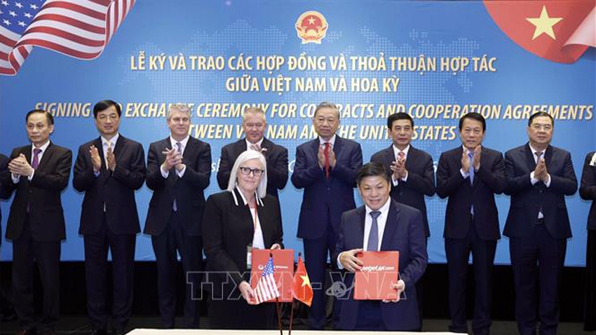 Tổng Bí thư Tô Lâm chứng kiến lễ trao Hợp đồng cung cấp động cơ GTF và dịch vụ bảo dưỡng toàn diện cho tàu bay A321NEO và A321 XLR giữa Vietjet Air (Việt Nam) và Pratt &amp; Whitney - Ảnh: TTXVN
