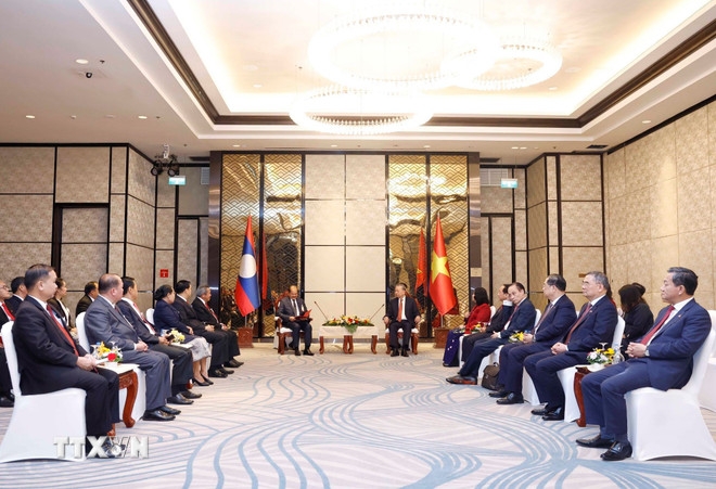 Tổng Bí thư Tô Lâm tiếp đồng chí Kikeo Khaykhamphithoune. (Ảnh: Thống Nhất/TTXVN)