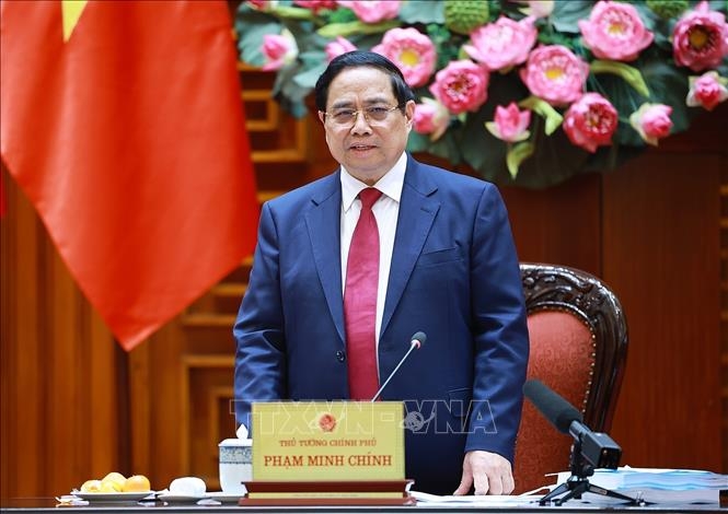 Thủ tướng Phạm Minh Chính phát biểu tại Phiên họp lần thứ ba của Ban Chỉ đạo quốc gia về tài chính toàn diện (Ảnh: Dương Giang/TTXVN)