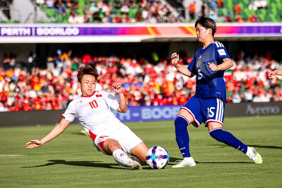 ĐT nữ Việt Nam thi đấu đầy quyết tâm (Ảnh: AFC)