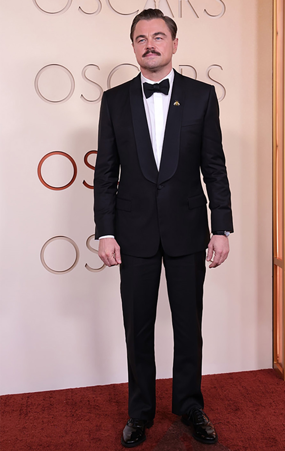 Leonardo DiCaprio, nam diễn viên từng đoạt giải Oscar hiện đang tham gia sản xuất bộ phim hợp tác mới nhất với Martin Scorsese, tác phẩm kinh dị bí ẩn “What Happens at Night”, trong đó anh đóng vai chính cùng với Jennifer Lawrence. (Leonardo DiCaprio tại Oscar 2026. Ảnh: Julian Hamilton/Getty Images)