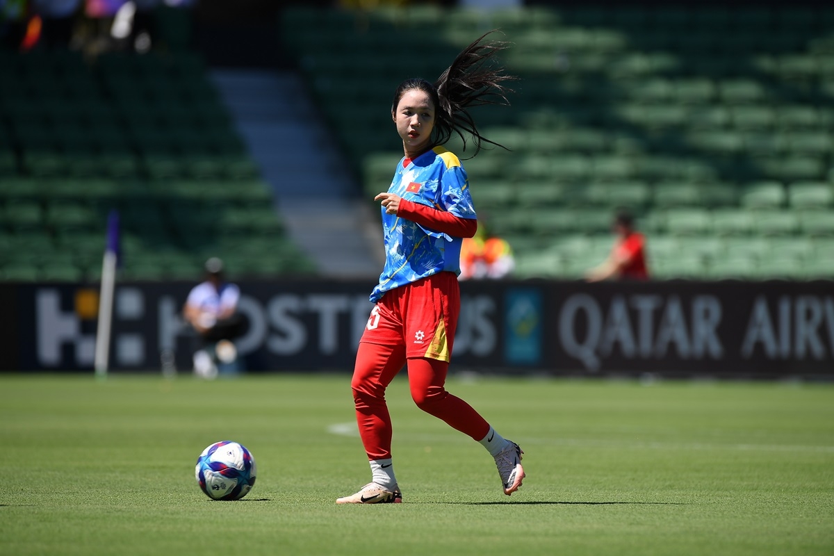 Các cầu thủ Việt Nam khởi động trước trận. (Ảnh: AFC). 