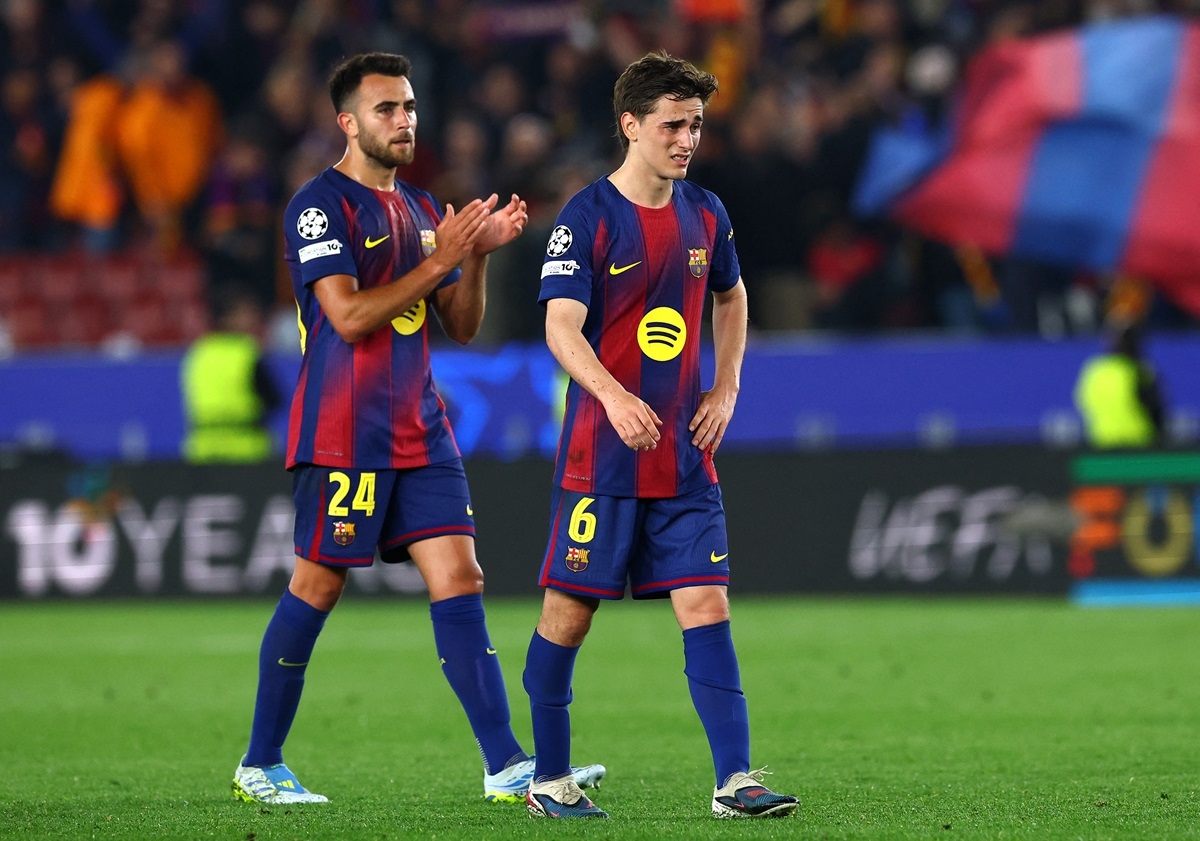 Sự thất vọng của các cầu thủ Barca. (Ảnh: Reuters). 