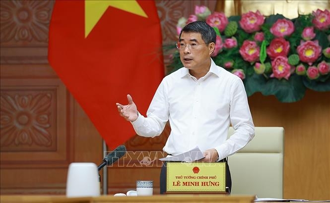 Thủ tướng Lê Minh Hưng làm việc với lãnh đạo Ngân hàng Nhà nước. Ảnh: Dương Giang/TTXVN