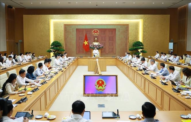 Thủ tướng Lê Minh Hưng làm việc với lãnh đạo Ngân hàng Nhà nước. Ảnh: Dương Giang/TTXVN
