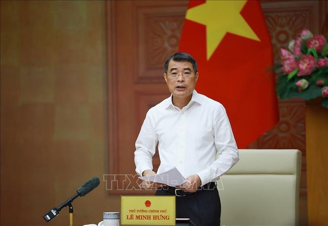 Thủ tướng Lê Minh Hưng làm việc với lãnh đạo Ngân hàng Nhà nước. Ảnh: Dương Giang/TTXVN