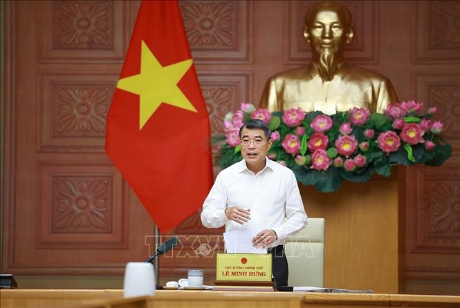 Thủ tướng Lê Minh Hưng làm việc với lãnh đạo Ngân hàng Nhà nước. Ảnh: Dương Giang/TTXVN