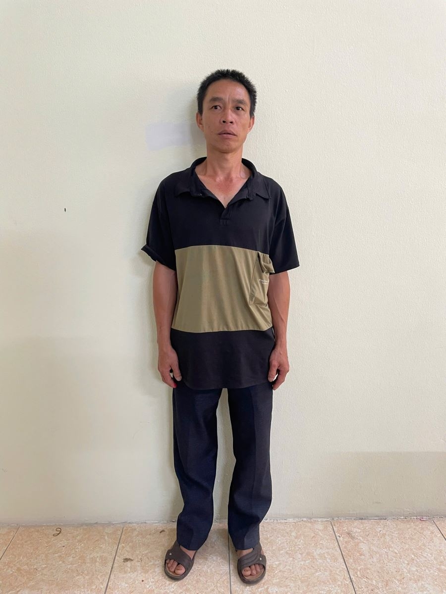 Trần Văn Minh tại cơ quan công an