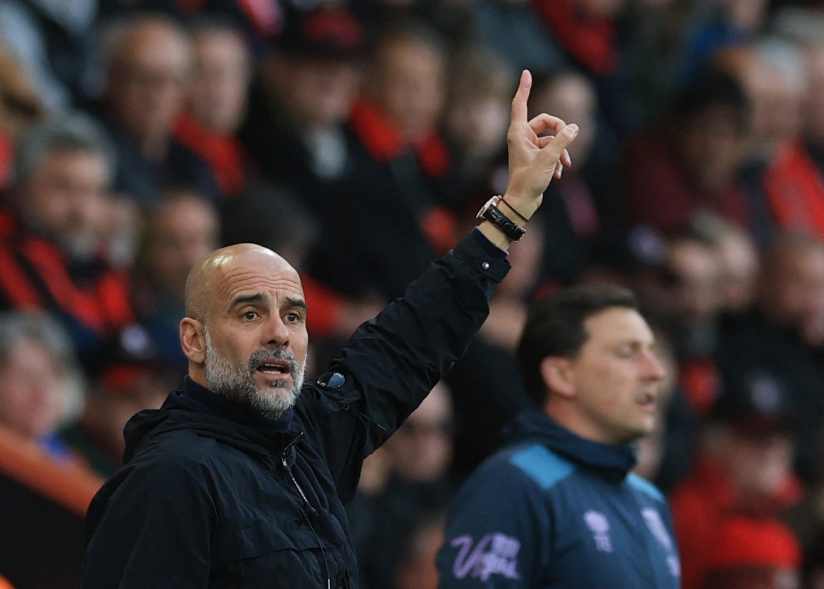 HLV Pep Guardiola không thể đánh bại Bournemouth (Ảnh: Reuters).