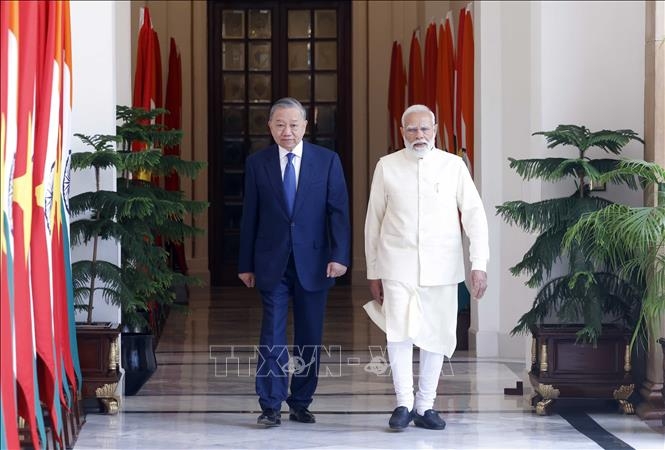 Tổng Bí thư, Chủ tịch nước Tô Lâm và Thủ tướng Ấn Độ Narendra Modi gặp hẹp. Ảnh: Thống Nhất/TTXVN
