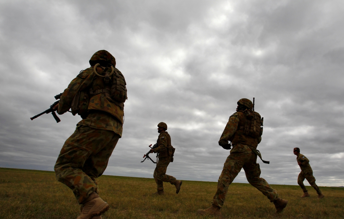 Australia không kiểm soát được số công dân phục vụ cho quân đội nước ngoài. Ảnh minh họa: Reuters