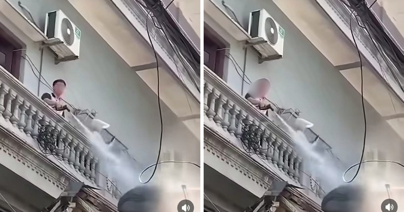 Người đàn ông dùng vòi nước xịt thẳng vào thợ xây nhà hàng xóm.