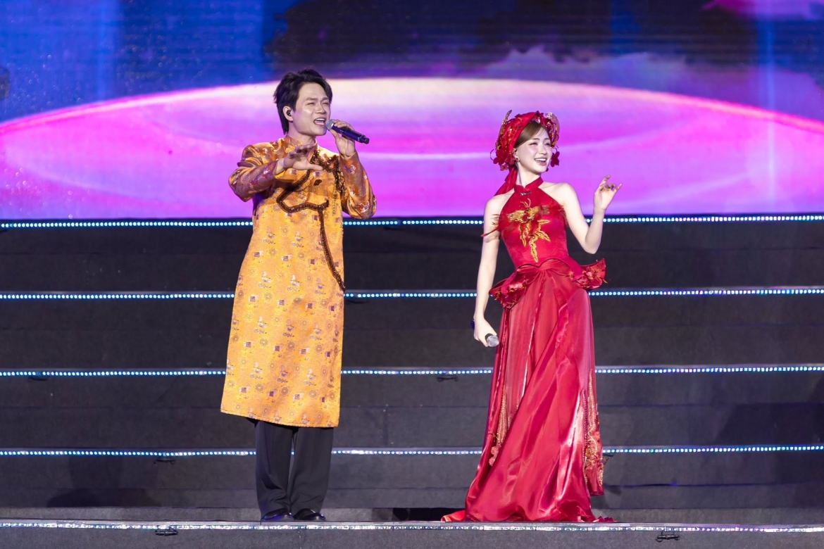 Nhạc sĩ Tuấn Cry và ca sĩ Hòa Minzy. Ảnh: FBNV