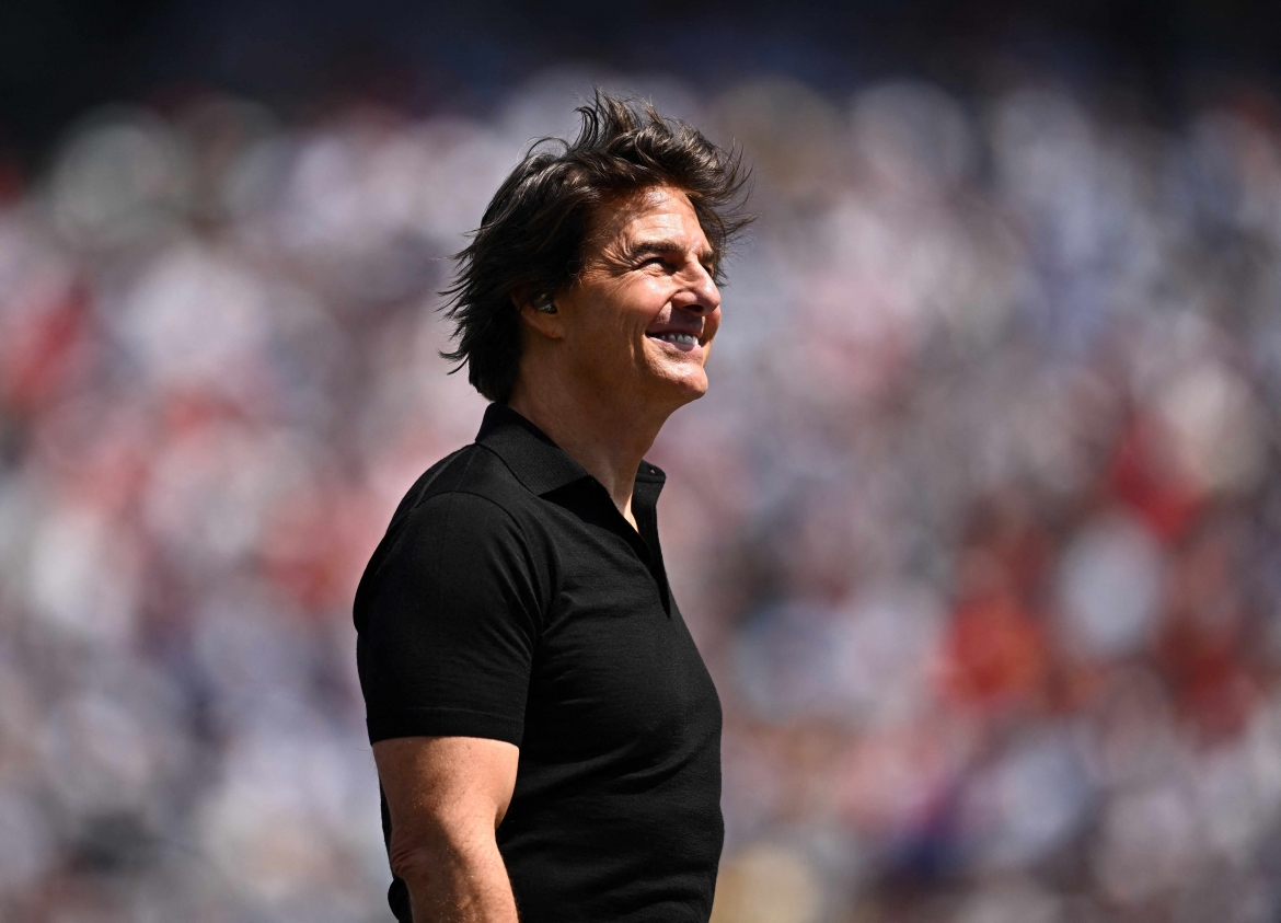 Tom Cruise xuất hiện trước trận chung kết, góp phần biến ngày hội bóng đá lớn nhất hành tinh thành sự kiện giải trí toàn cầu. (Ảnh: Reuters)