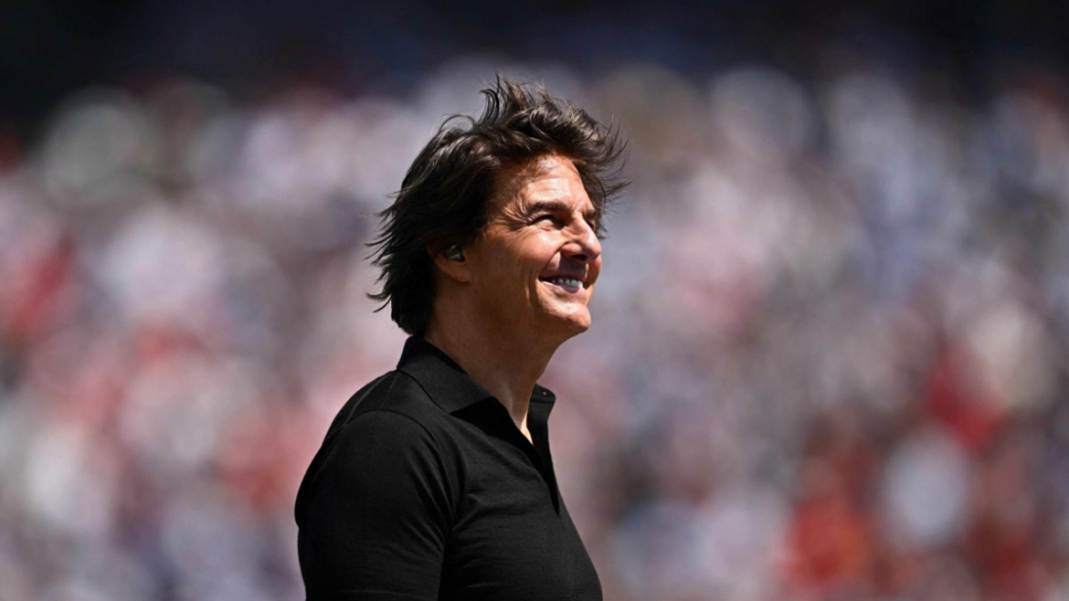 Tom Cruise xuất hiện trước trận chung kết, góp phần biến ngày hội bóng đá lớn nhất hành tinh thành sự kiện giải trí toàn cầu. (Ảnh: Reuters)