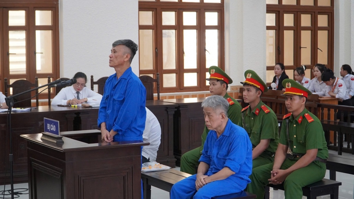 Ông Phan Đoàn Thái (người đứng) tại phiên toà. Ảnh: B.H