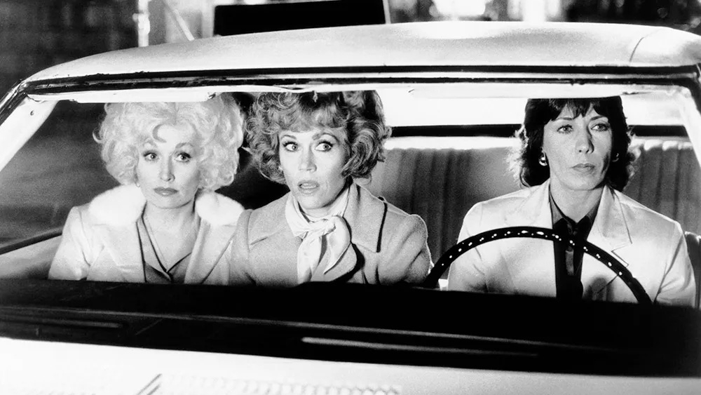 Từ trái sang: Dolly Parton, Jane Fonda và Lily Tomlin trong bộ phim 9 to 5 năm 1980. (Ảnh: 20th Century Fox Film Corp/Courtesy Everett Collection)